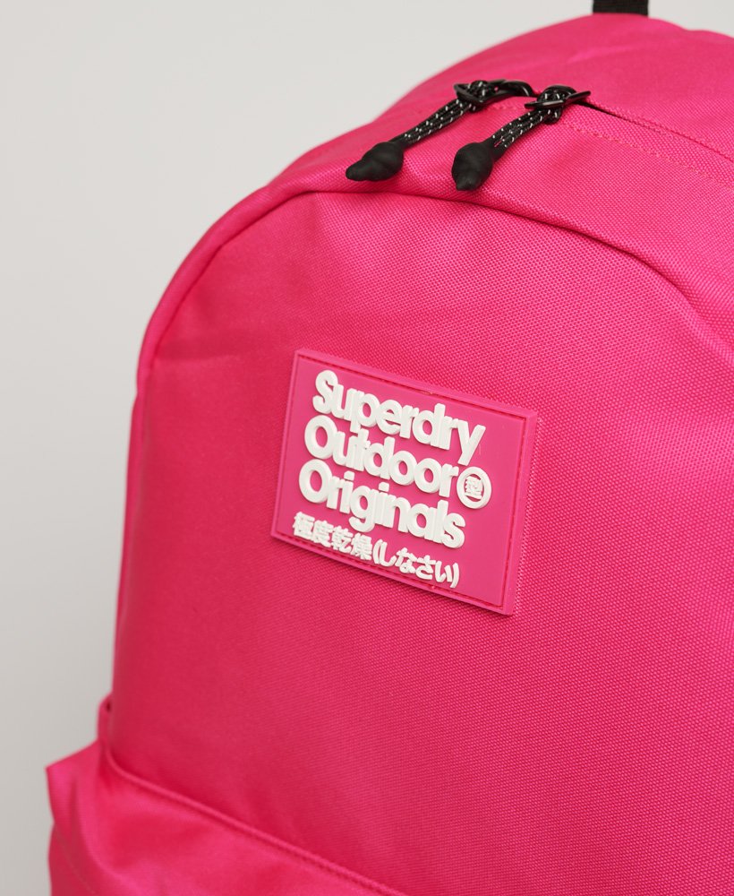 originele montana rugzak in fluorescerend roze.