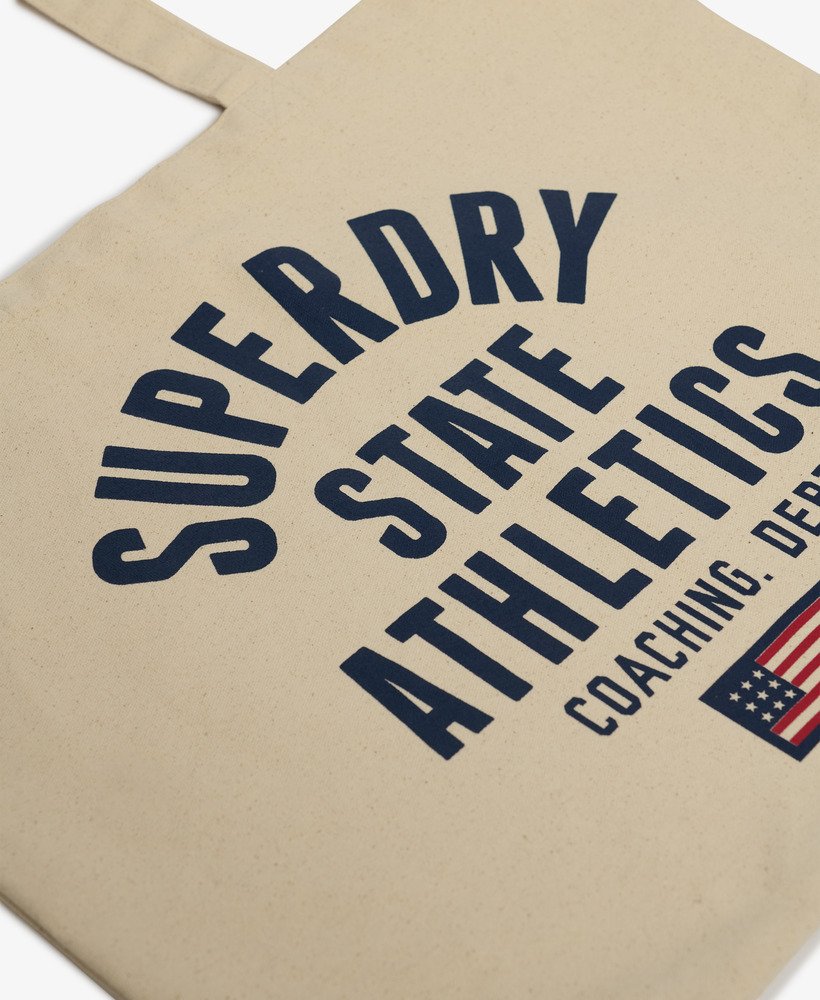 superdry tote in natural brownrichest navy