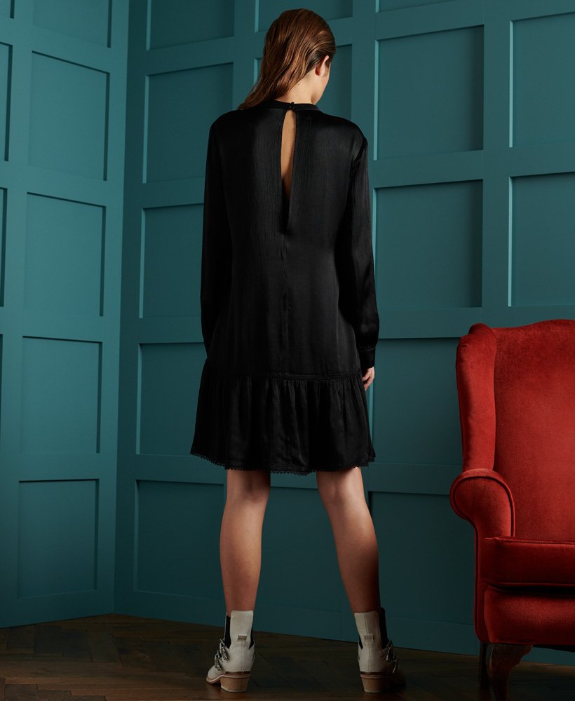 jurk van dry lace in beperkte oplage in zwart.