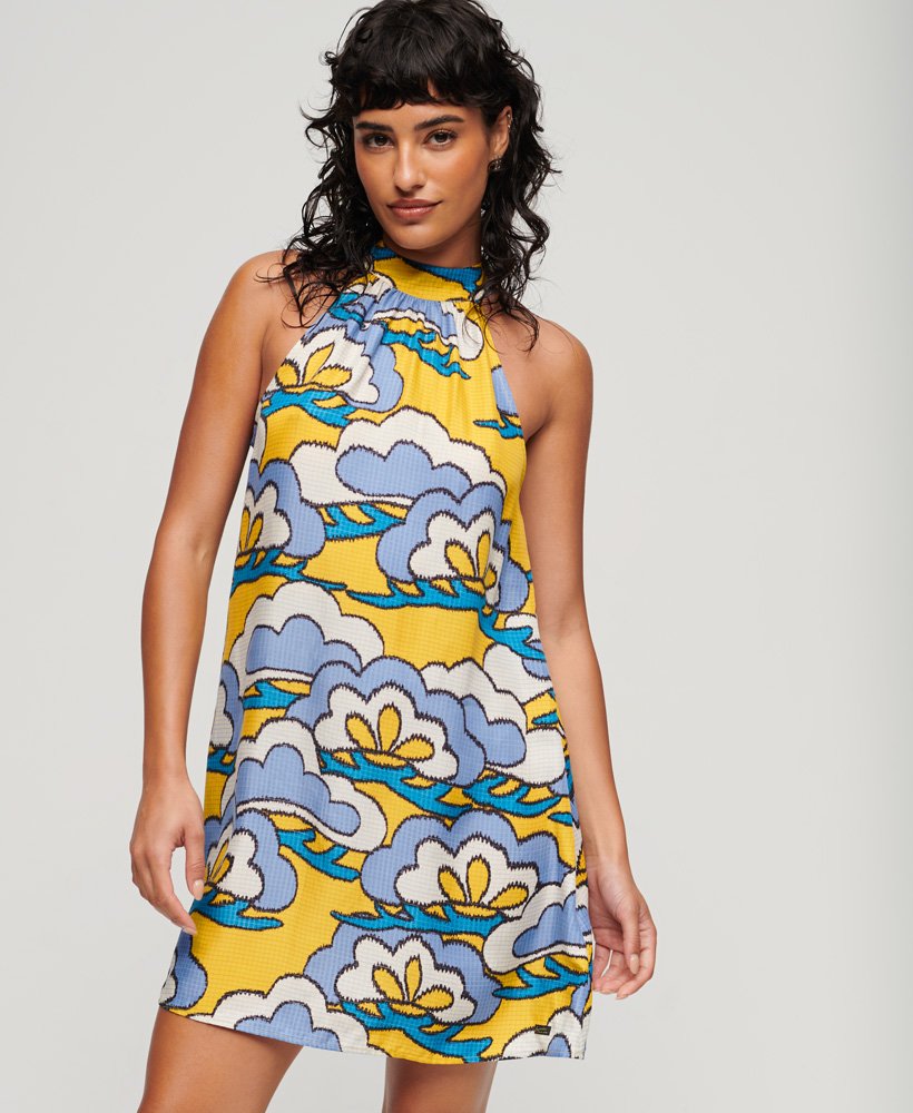 mouwloze mini-jurk met hoge hals in wolkgeel met bloemenprint