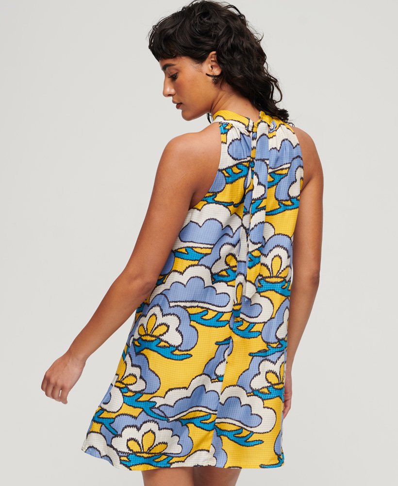 mouwloze mini-jurk met hoge hals in wolkgeel met bloemenprint