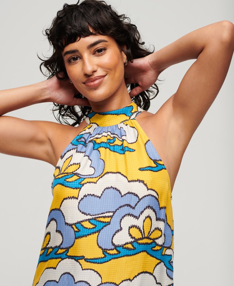 mouwloze mini-jurk met hoge hals in wolkgeel met bloemenprint