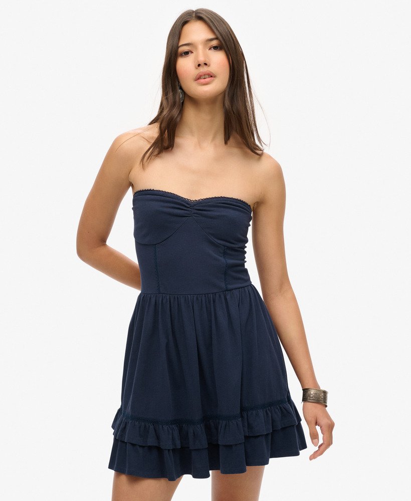 mini-jurk met kanten bandeau uit de jaren 50 in een prachtige marineblauwe kleur.