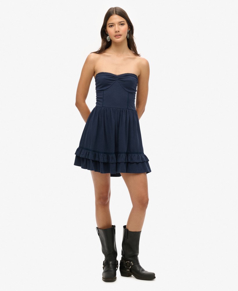 mini-jurk met kanten bandeau uit de jaren 50 in een prachtige marineblauwe kleur.