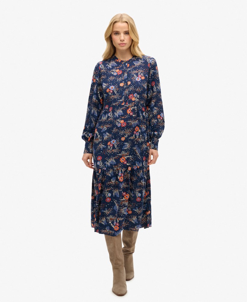 midi-jurk met lange mouwen en ruches in een blauwe alma-bloemenmix.