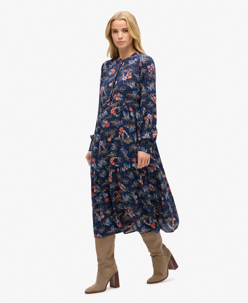 midi-jurk met lange mouwen en ruches in een blauwe alma-bloemenmix.