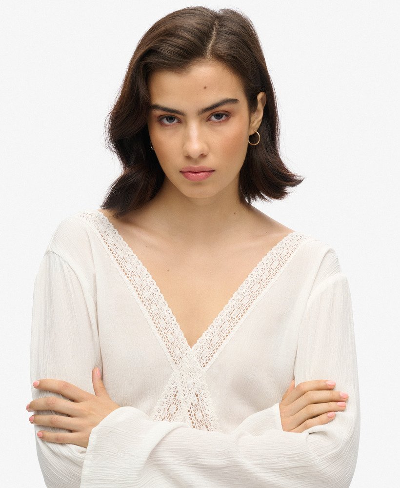playsuit met uitlopende mouwen en uitsparingen in ecru