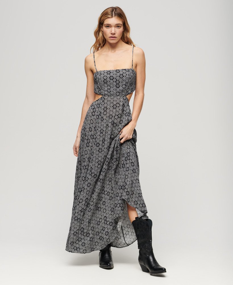 maxi-jurk met transparante achterkant in zwart jaren 70 geometrische stijl.