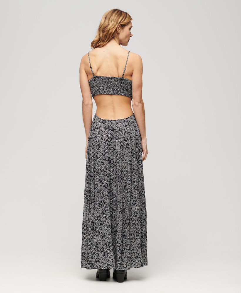 maxi-jurk met transparante achterkant in zwart jaren 70 geometrische stijl.