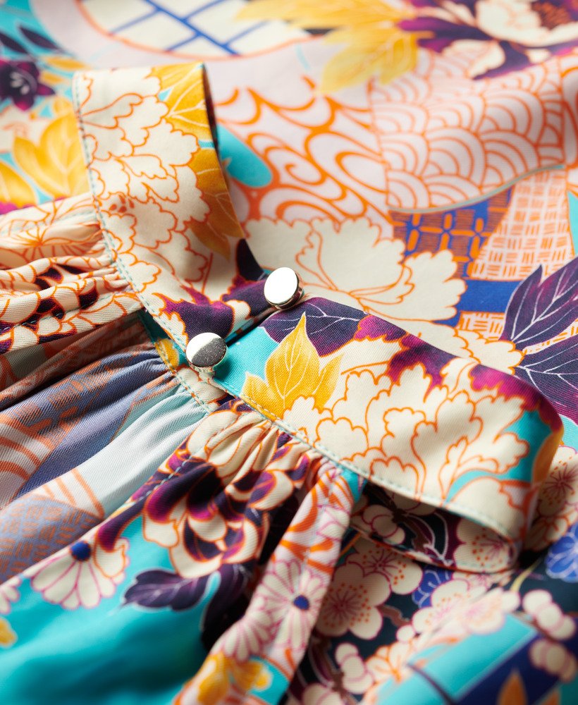mouwloze mini-jurk met print in aqua ni hanadukushi