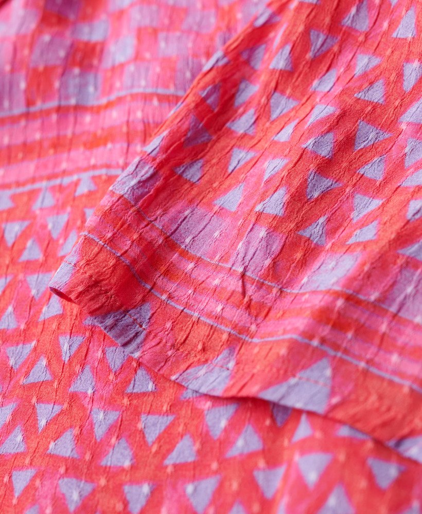bedrukte midi-jurk met uitsnijdingen in shibori-laagje in roze
