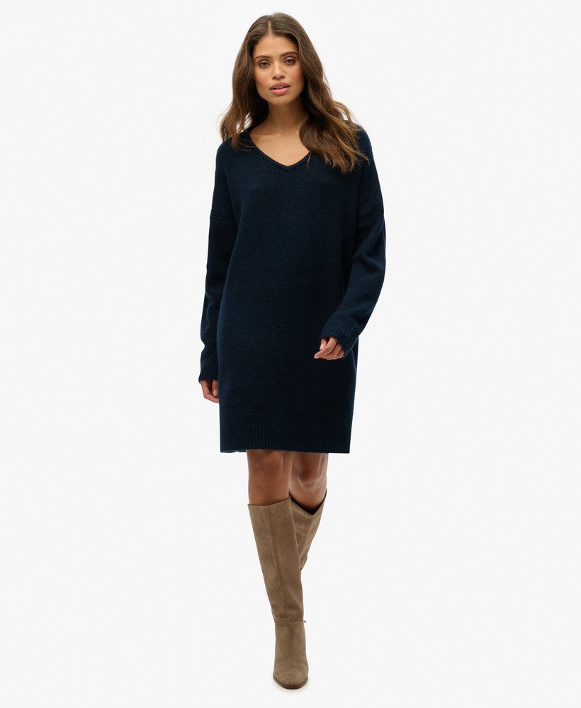 oversized v-hals jurk in donkerblauwgroen met een twist