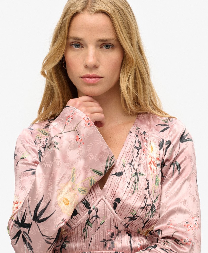 mini-jurk met uitlopende mouwen en jacquardstof in een zachtroze bloemenprint in de japanse schaduw.