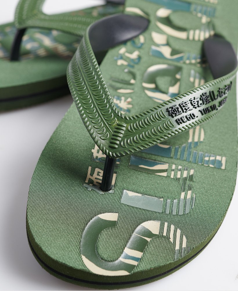 camouflage teenslippers met logo in olijfgroenzwart.