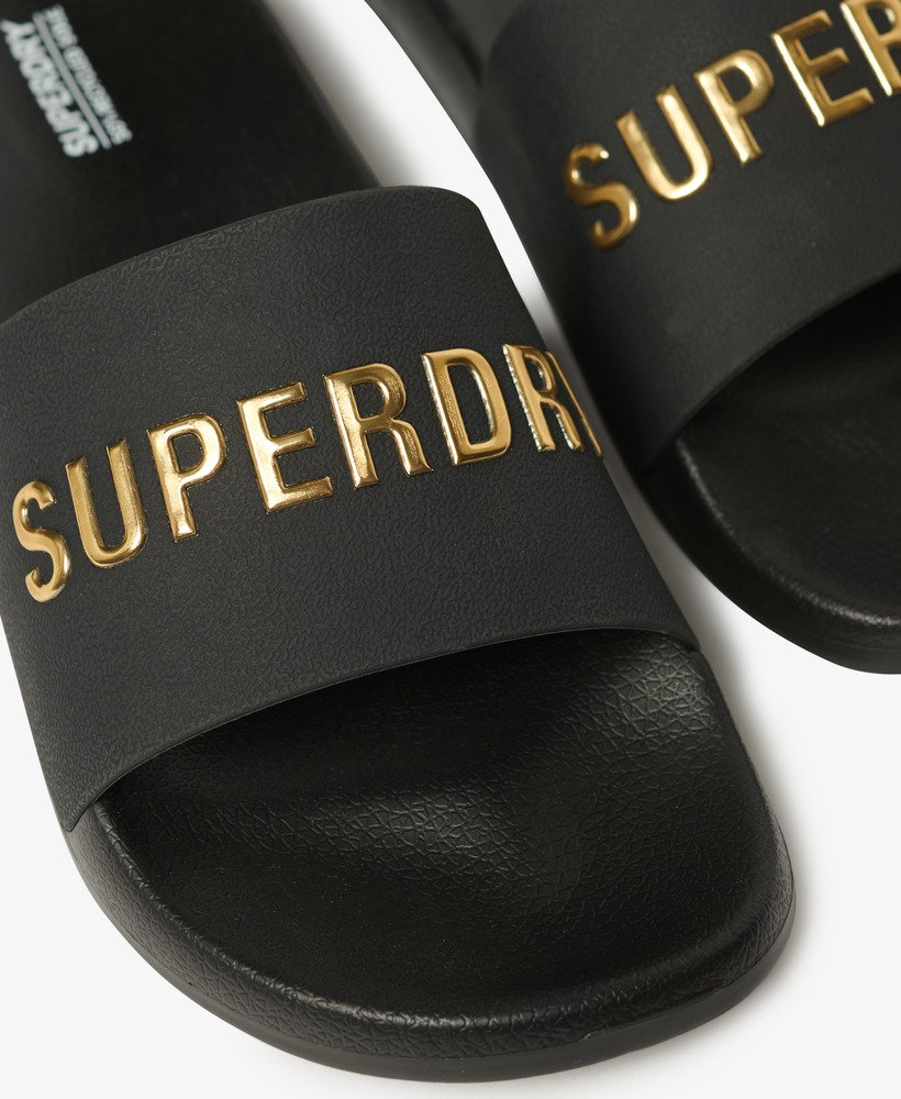 veganistische badslippers met logo in zwartmetallic goud