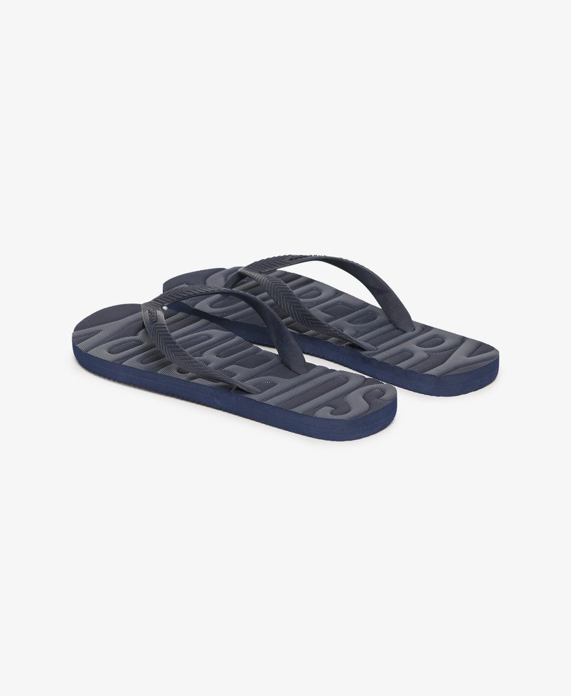 vintage veganistische teenslippers in een rijke marineblauwe tint.