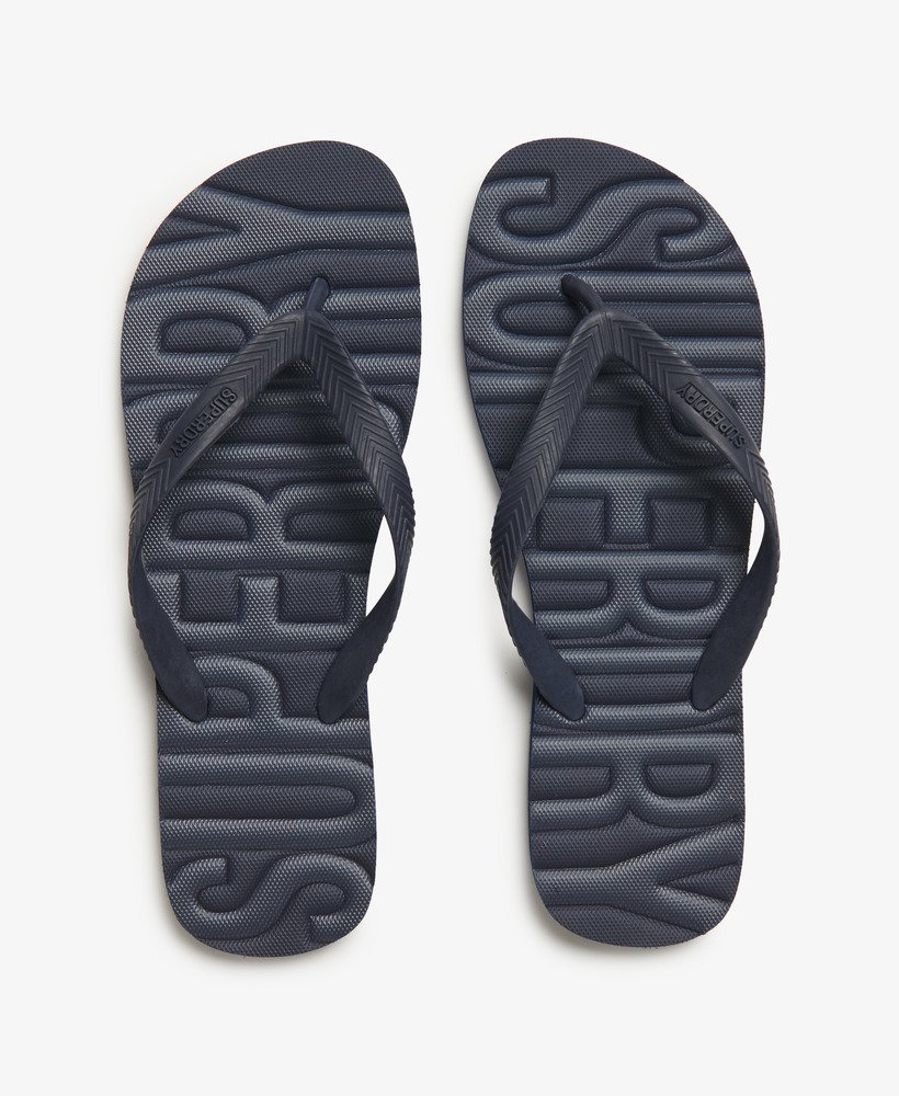 vintage veganistische teenslippers in een rijke marineblauwe tint.