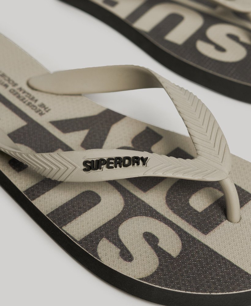 vegan teenslippers met logo in leigrijssteenkleur.