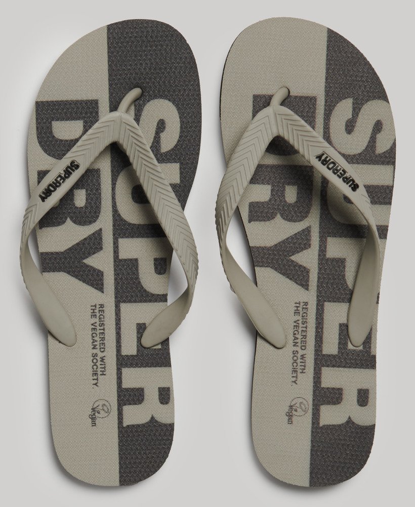 vegan teenslippers met logo in leigrijssteenkleur.