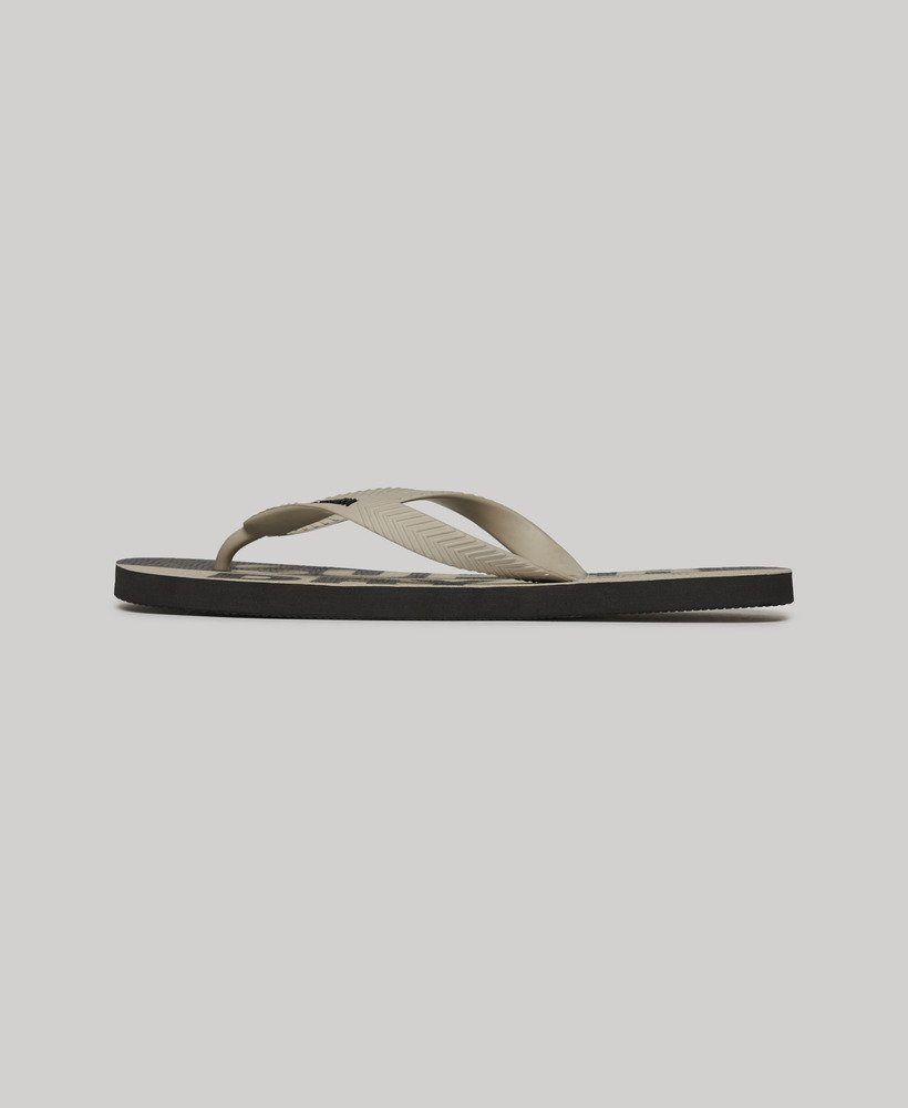 vegan teenslippers met logo in leigrijssteenkleur.