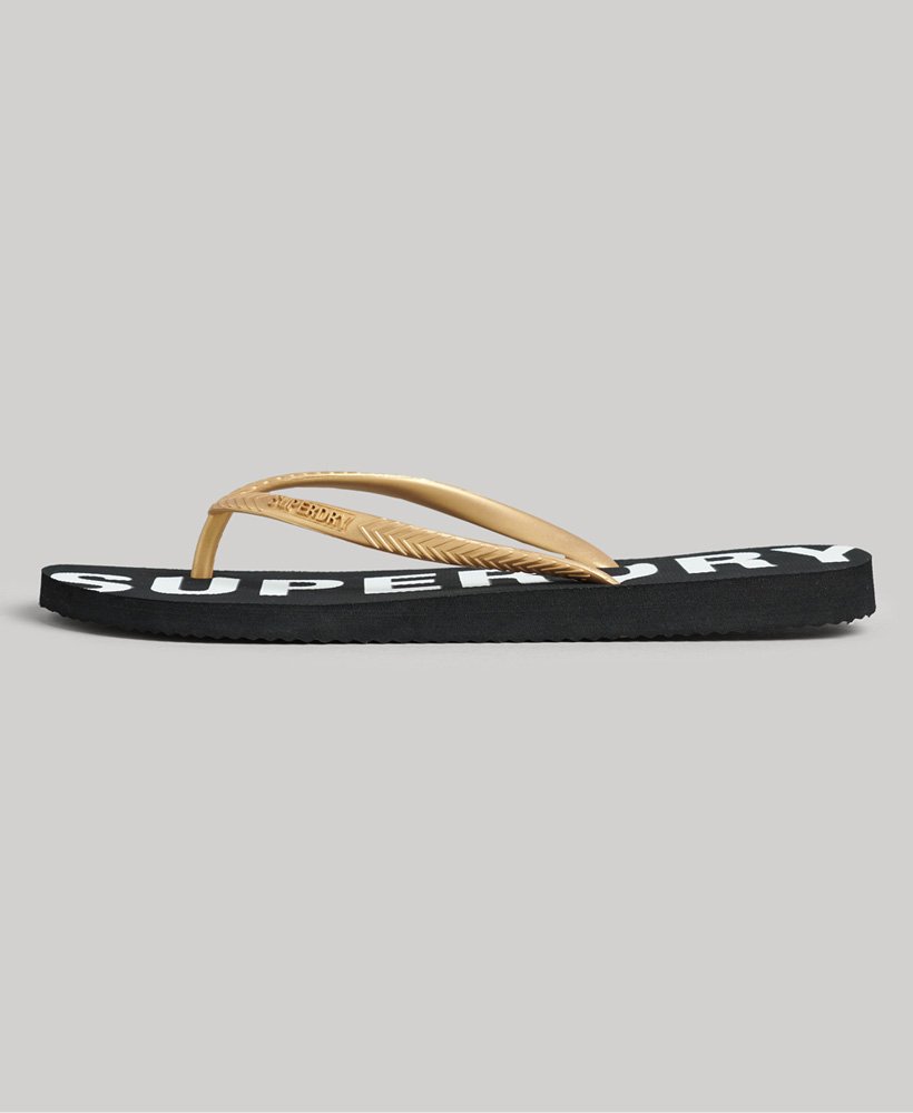 code core sport teenslippers in zwartmetallic goud