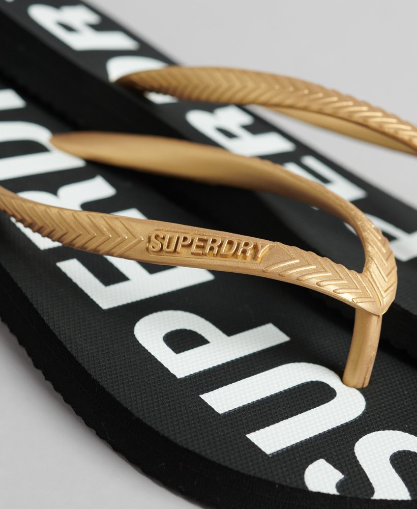 code core sport teenslippers in zwartmetallic goud