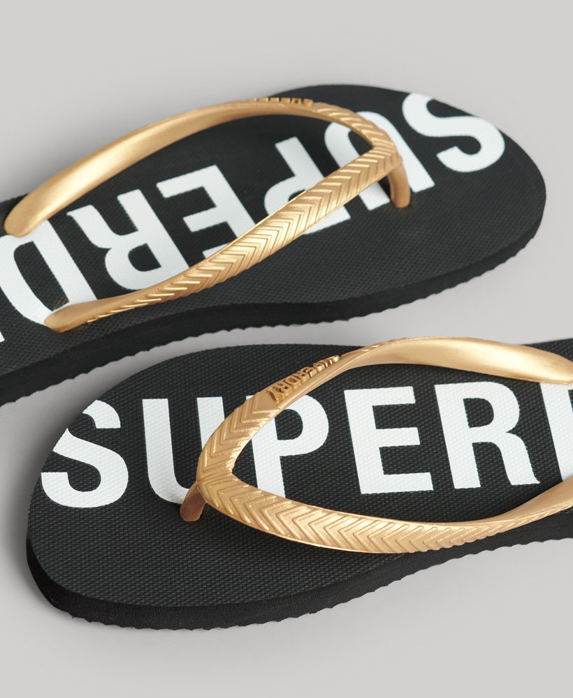 code core sport teenslippers in zwartmetallic goud