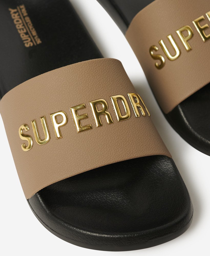 veganistische badslippers met logo in zwartfossilbruinmetallic goud