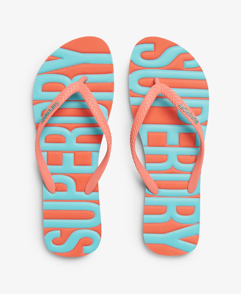 vintage veganistische teenslippers in koraalkleur.