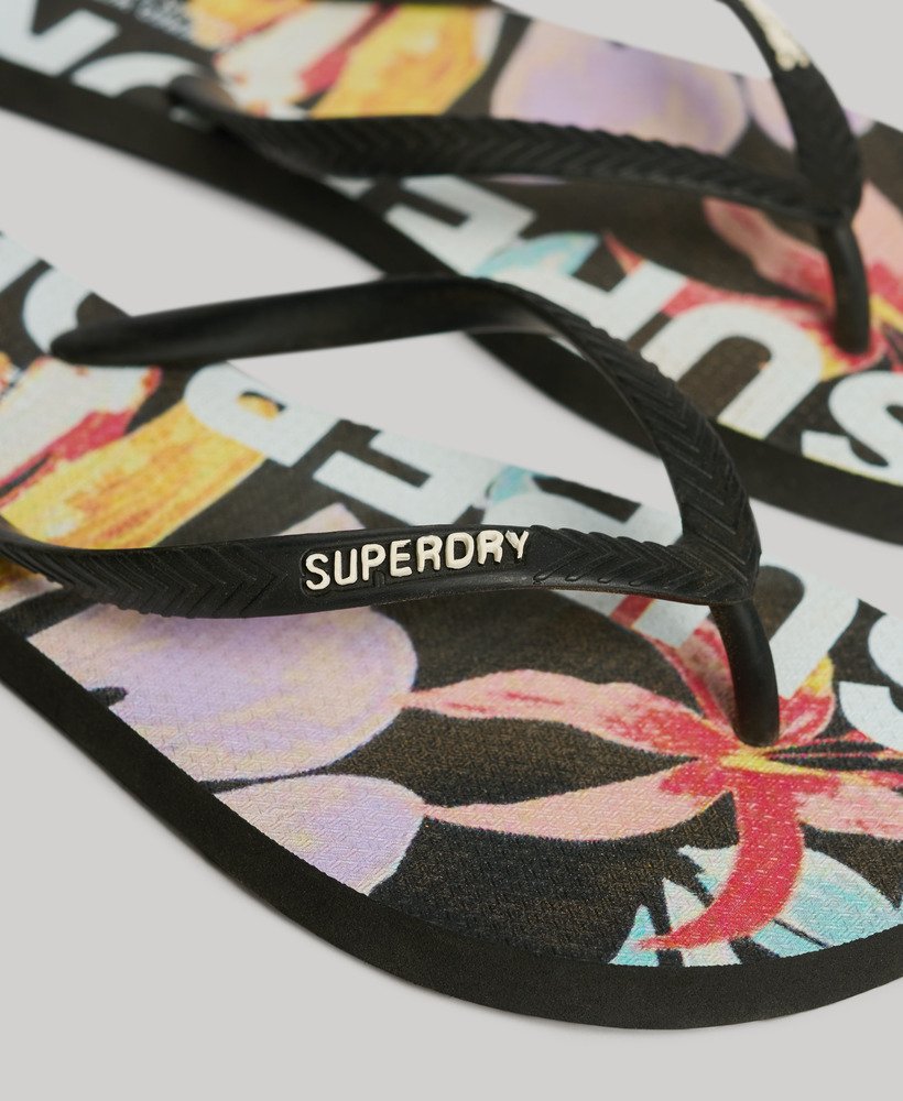 veganistische teenslippers met logo in orange tropic aop