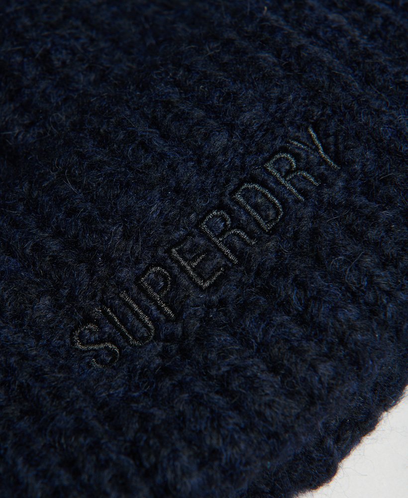 essentiële geribbelde muts in donkerblauw.
