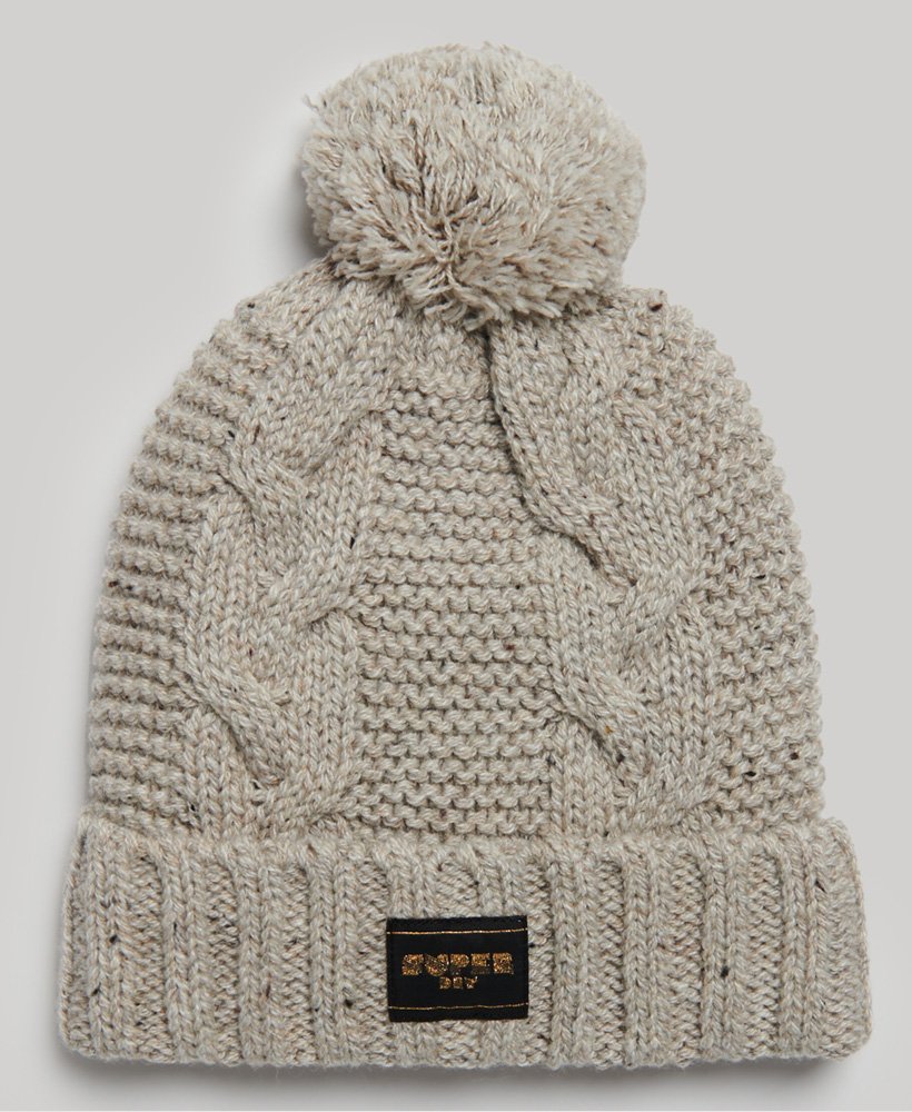 kabelgebreide muts in haverbeige met spikkels