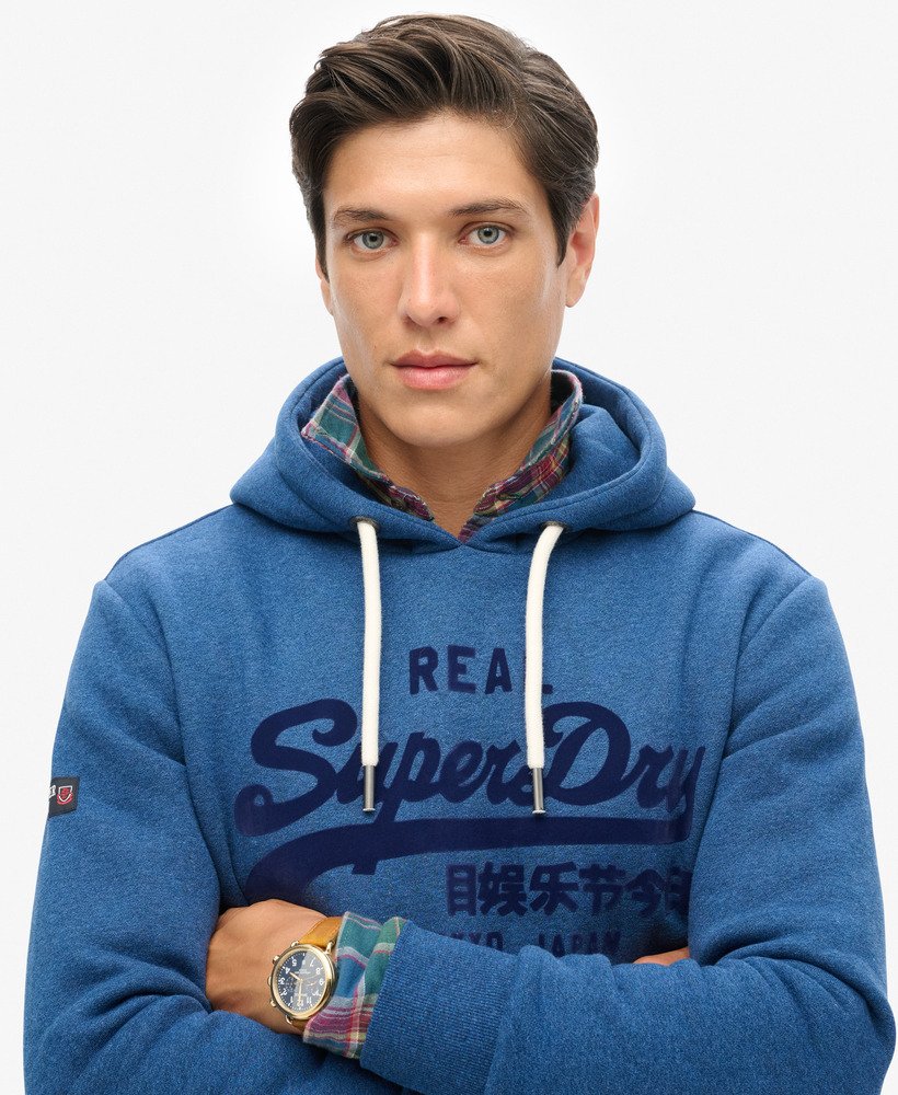 hoodie met vintage logo in effen kleuren in een helderblauwe gemêleerde uitvoering.
