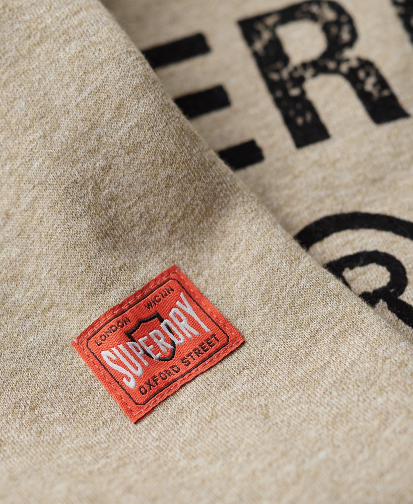 werkkledinglogo vintage crew sweatshirt in beige met bruine spikkels.
