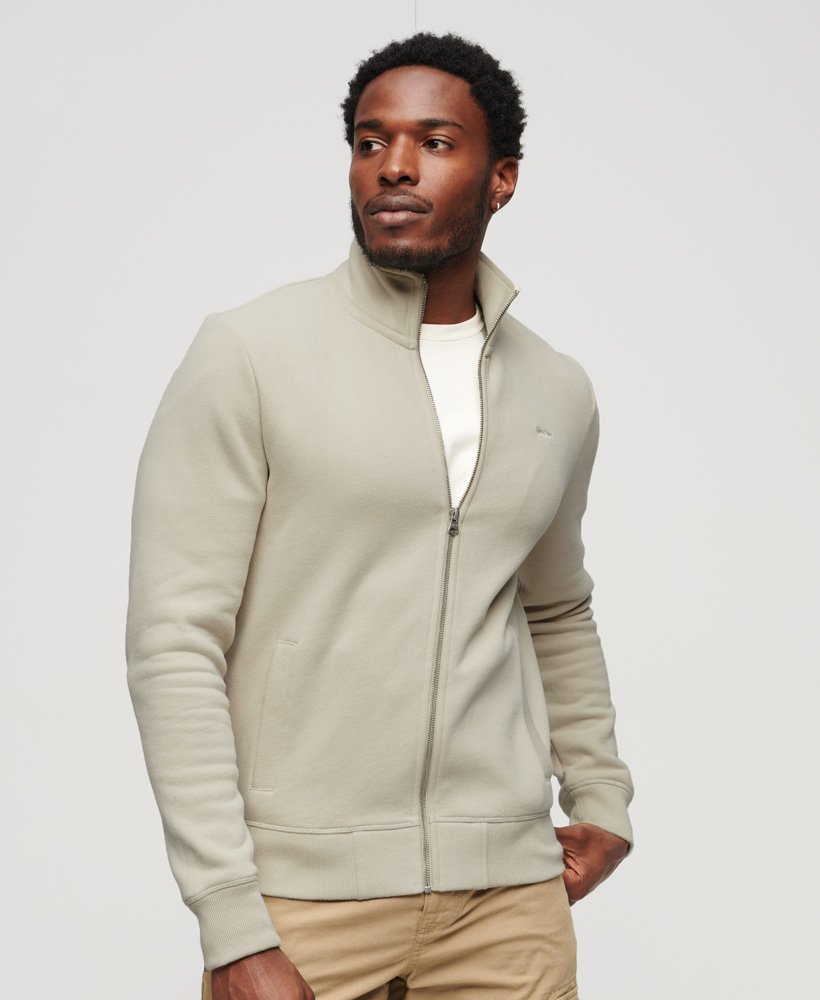 essential logo zip track top in light stone beige