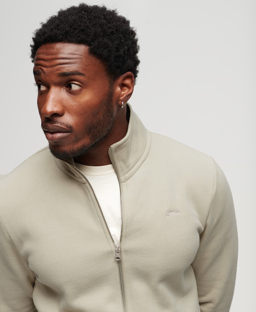 essential logo zip track top in light stone beige