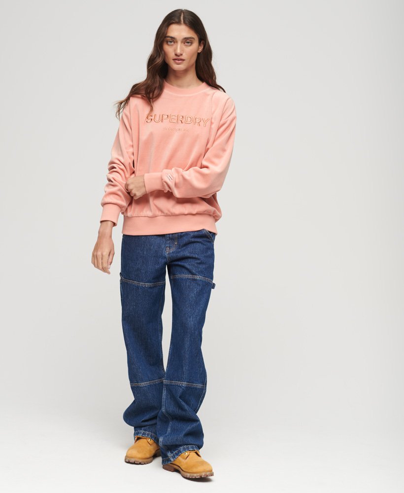 velours sweatshirt met grafische print en wijde pasvorm in perzikbeige.