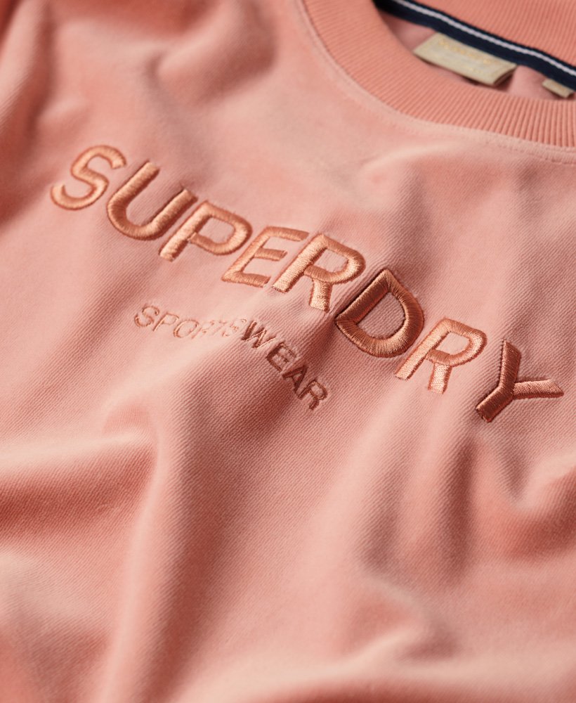 velours sweatshirt met grafische print en wijde pasvorm in perzikbeige.