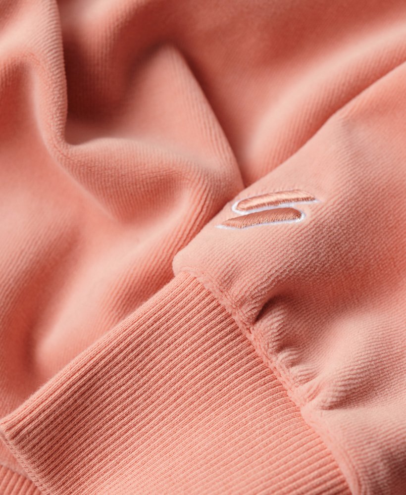 velours sweatshirt met grafische print en wijde pasvorm in perzikbeige.