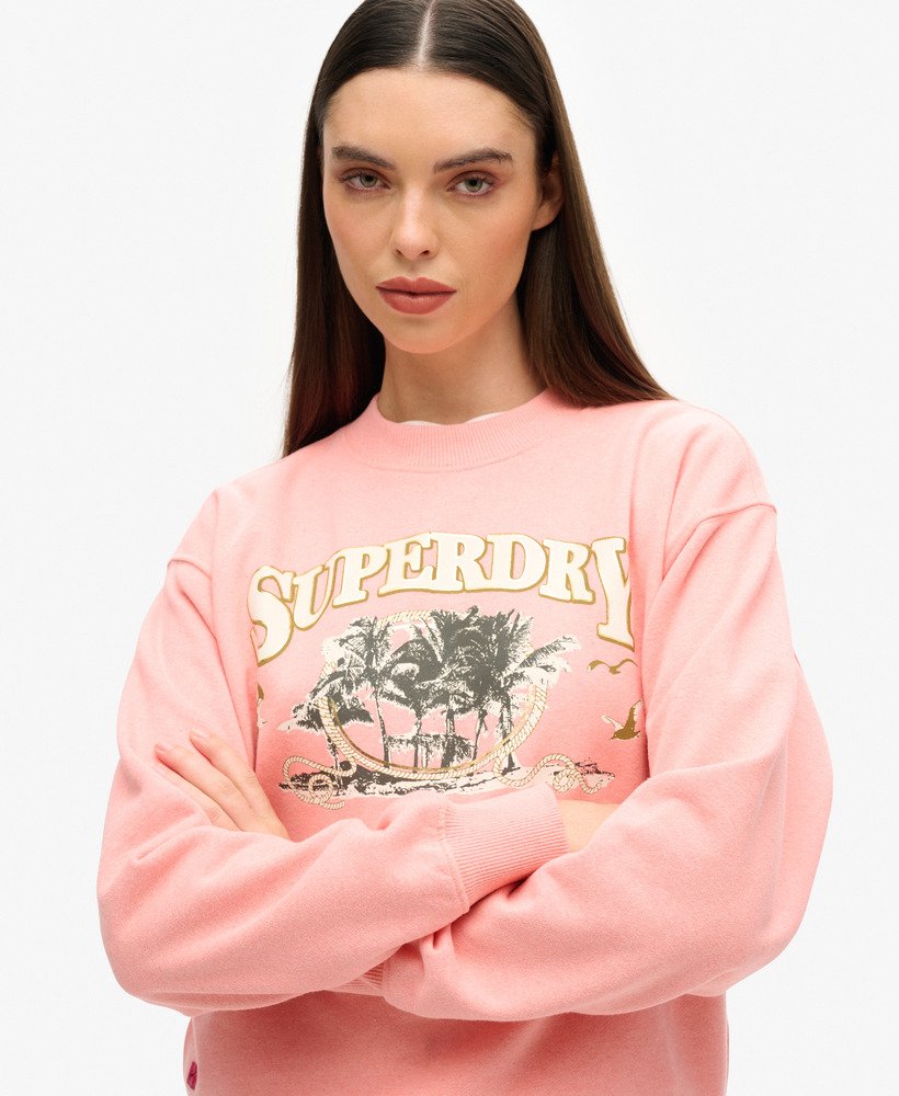reissouvenir losvallende sweater in perzikroze gemêleerd