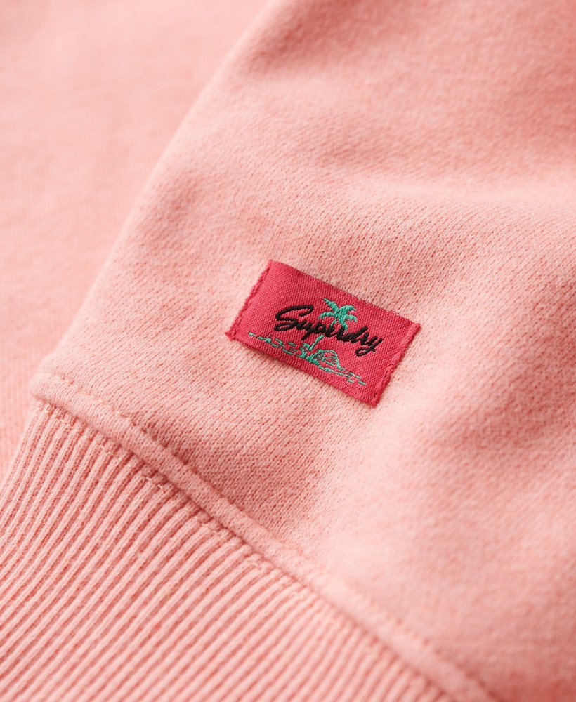 reissouvenir losvallende sweater in perzikroze gemêleerd