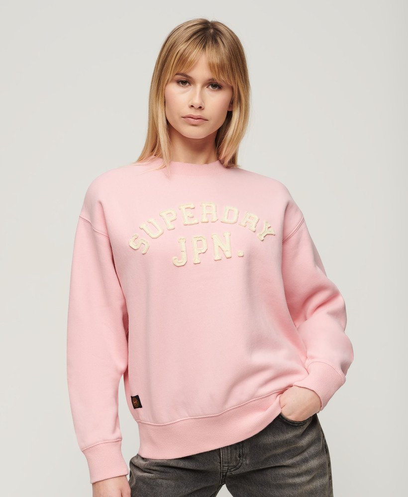 appliqué sportieve losse sweater in romantisch roze.