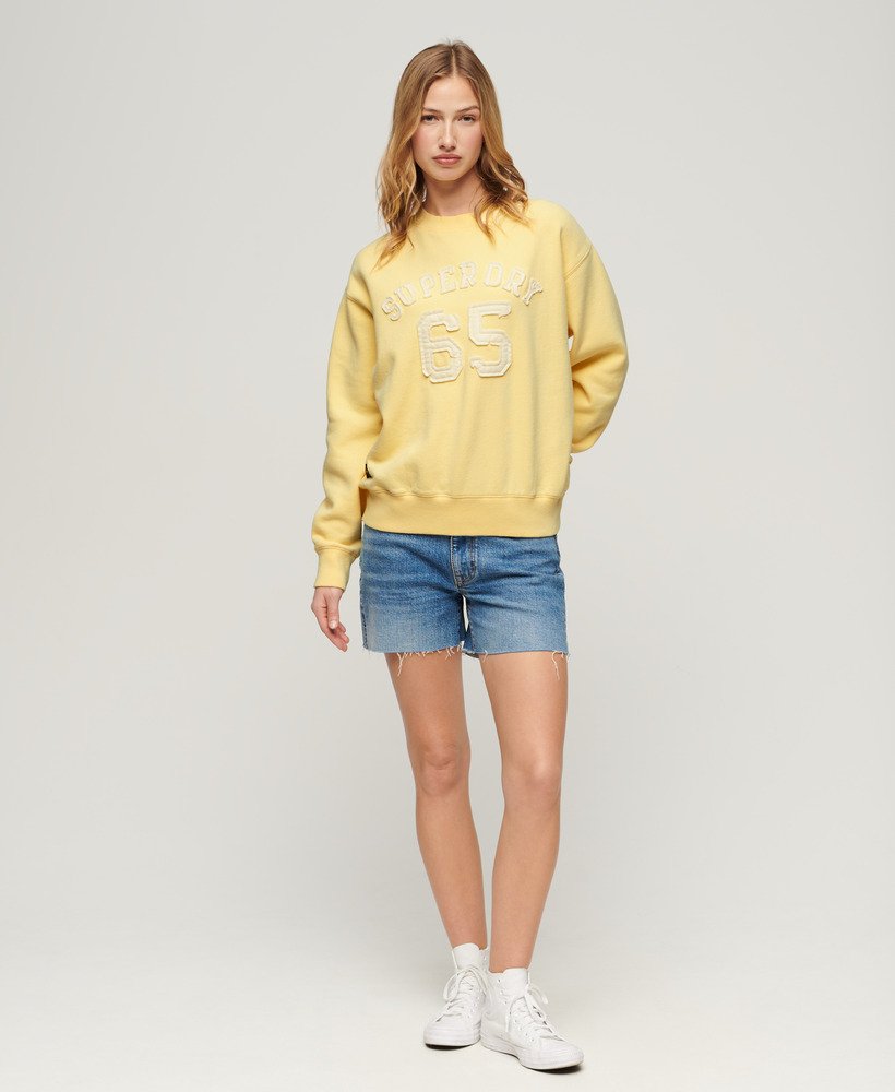 sportieve losse sweater met applicaties in lichtgeel