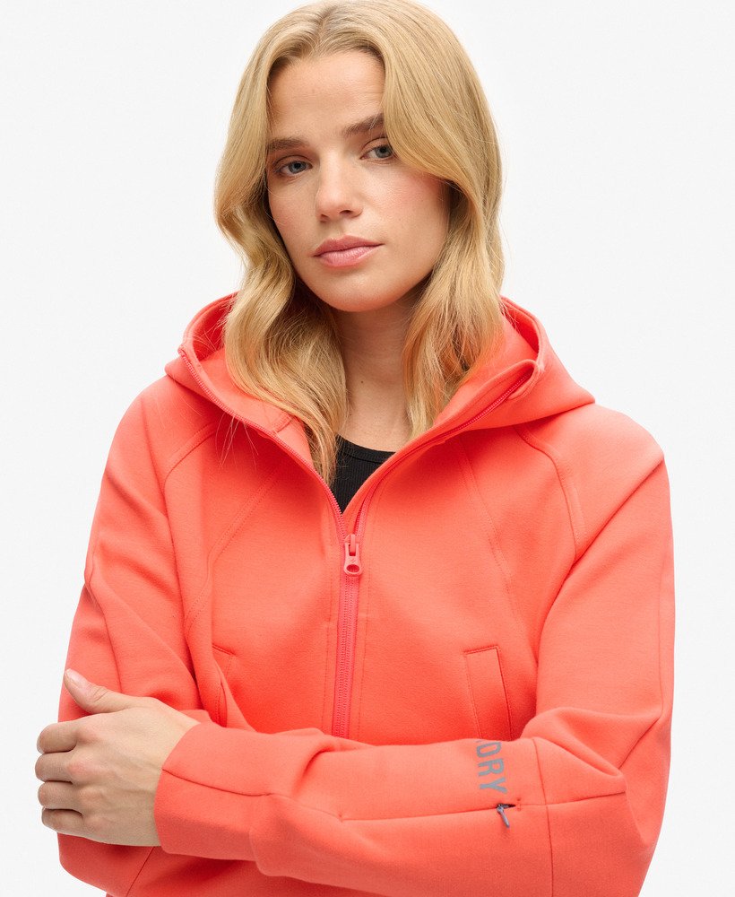 sport tech relaxed zip-hoodie in hot coral