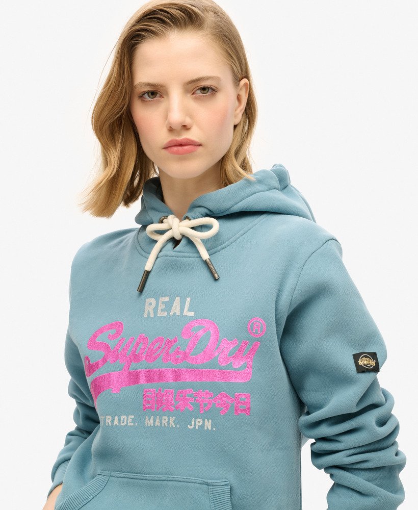 hoodie met vintage logo en versieringen in egeïsch blauw.
