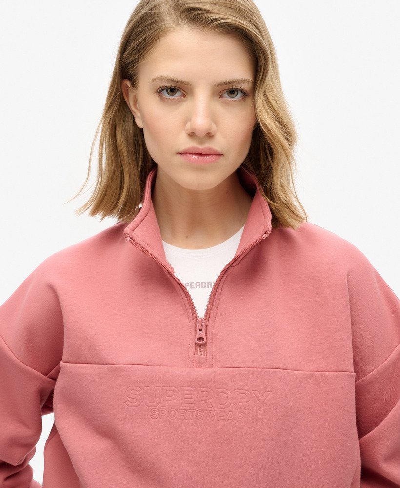 sport tech relaxed half zip sweatshirt in withered rose