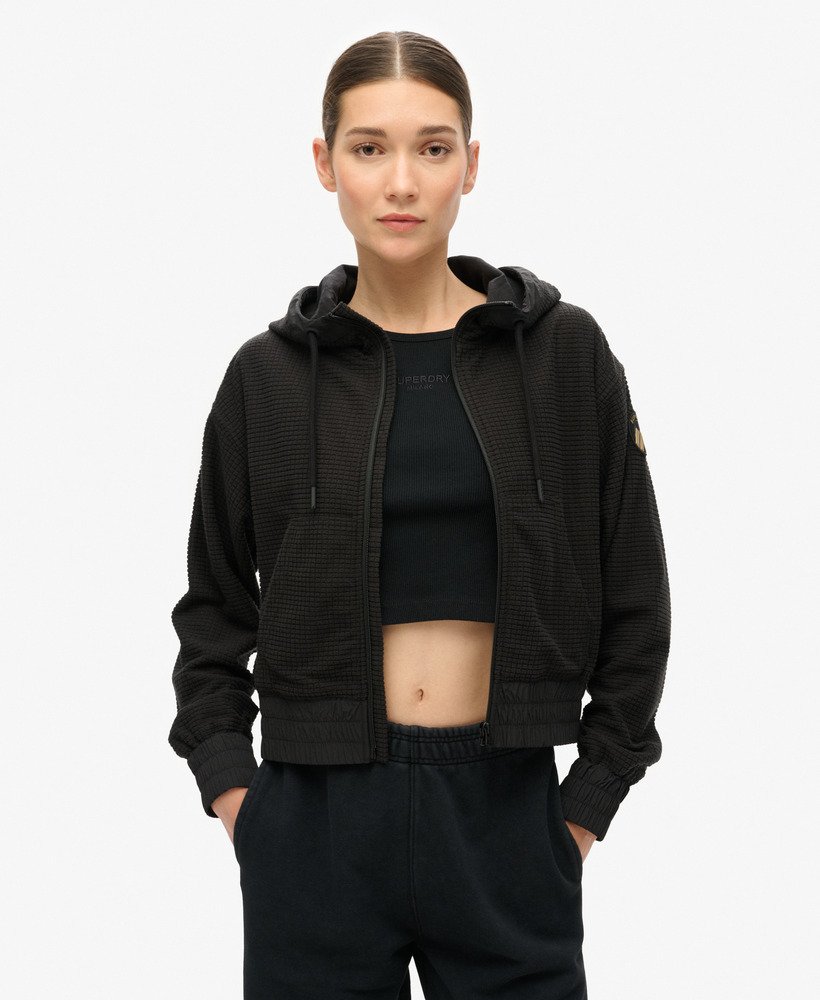 sport tech grid fleece ziphood in zwart
