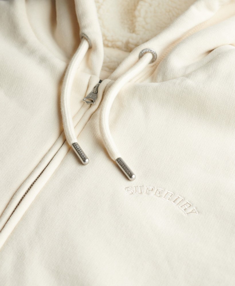 borg gevoerde hoodie met rits in de kleur turtledove cream.