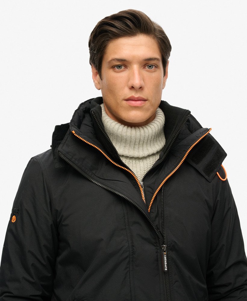 pop zip hood arctic sd-windcheater jacket in zwartfluororanje