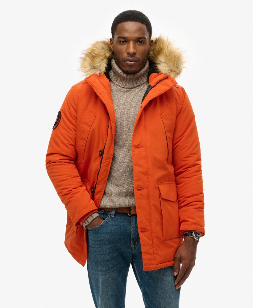 everest parka met capuchon van imitatiebont in de kleur gepureerde pompoen.